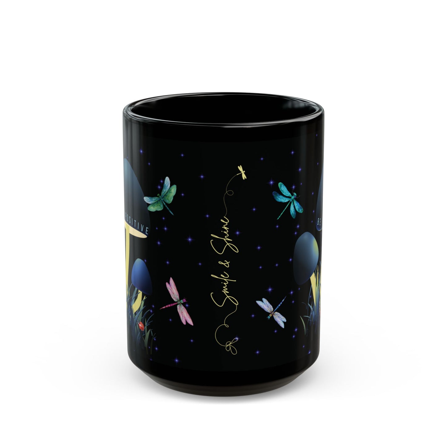 Black mug with colorful dragonfly designs and text on it