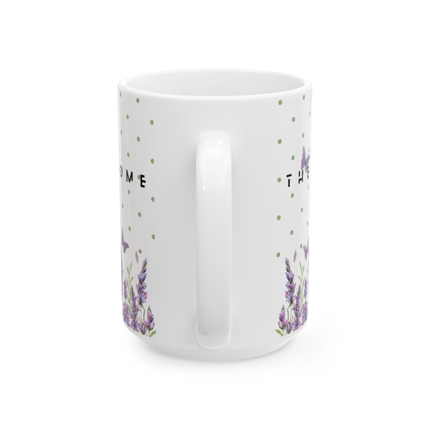 handle view White mug with floral designs and text on a white background