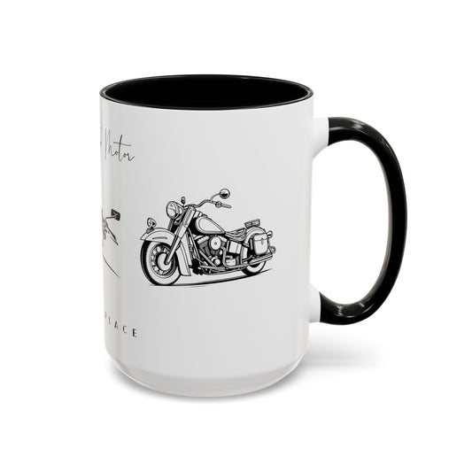 white mug with black c shape handle with bike designon it