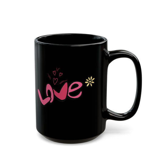 Black mug with 'love' written in pink on a white background