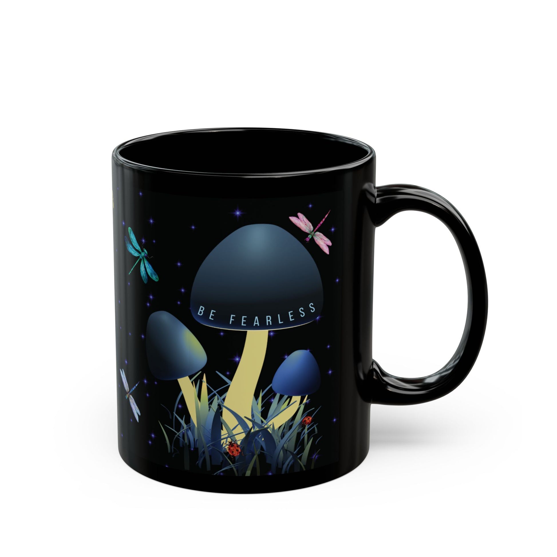 Black mug with mushroom design and 'Be Fearless' text on it